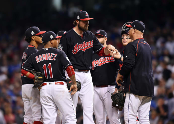 Nov 2, 2016; Cleveland, OH, USA; Cleveland Indians relief pitcher Andrew Miller hands the ball to manager Terry Francona in the 7th inning in game seven of the 2016 World Series against the Chicago Cubs at Progressive Field. Mandatory Credit: Ken Blaze-USA TODAY Sports